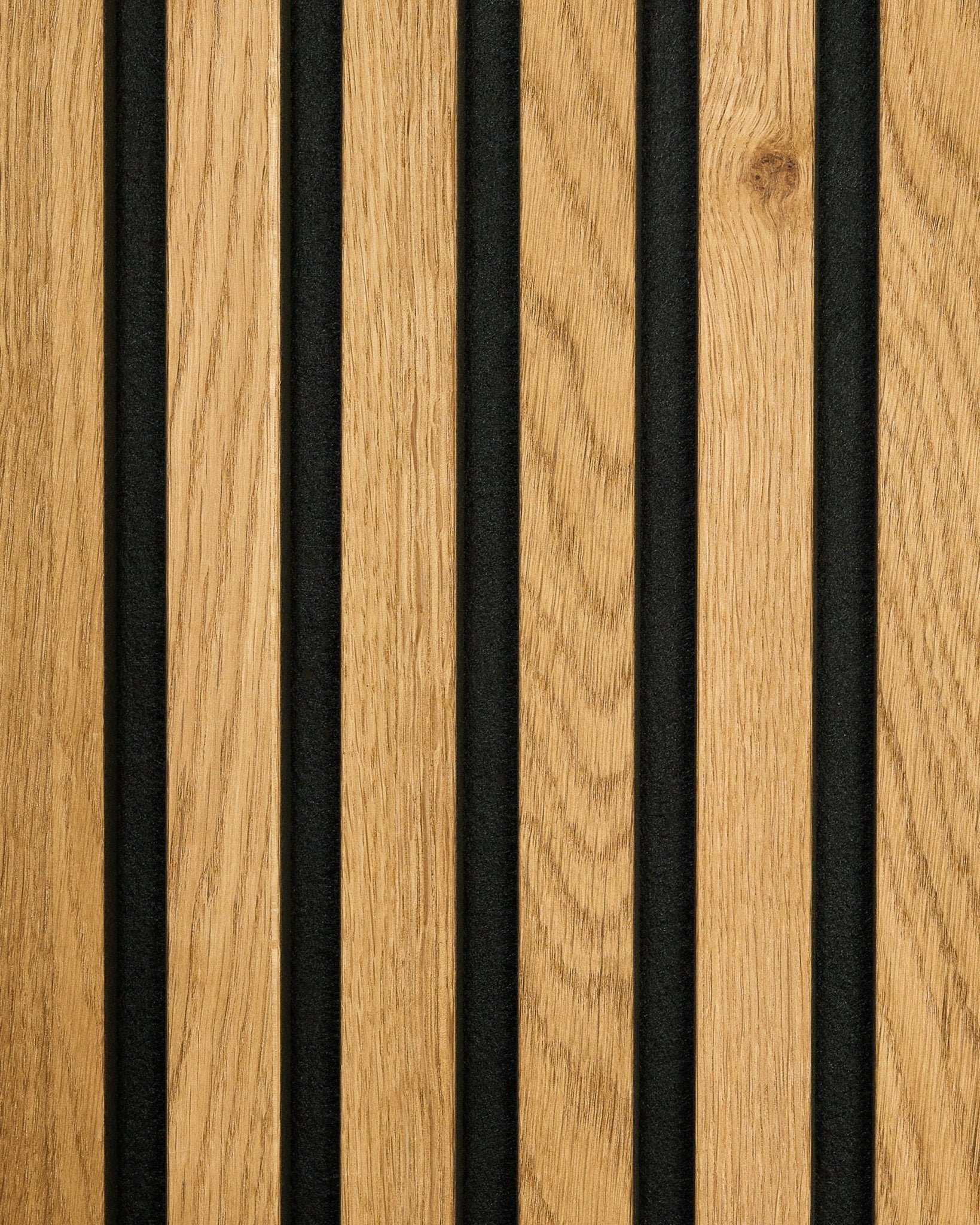 WoodUpp Akupanel in Rustic Brown Oak features vertical wooden slats alternating with black panels, creating a striped acoustic panel design.
