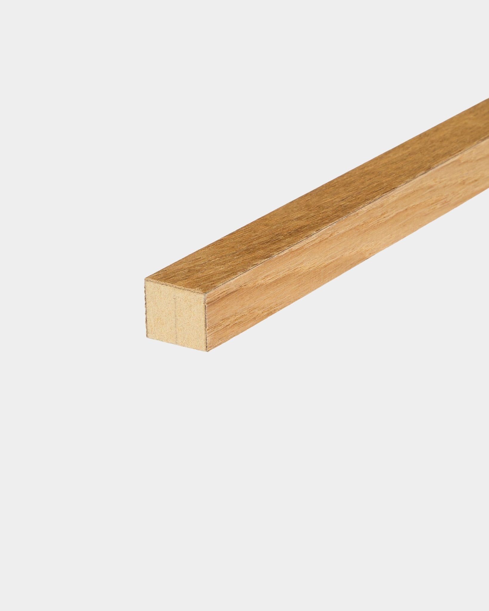 WoodUpp End Lamella in Rustic Brown Oak (2.2 cm), used as a finishing edge for Akupanel acoustic panels or constructing an MDF frame for panel installation.