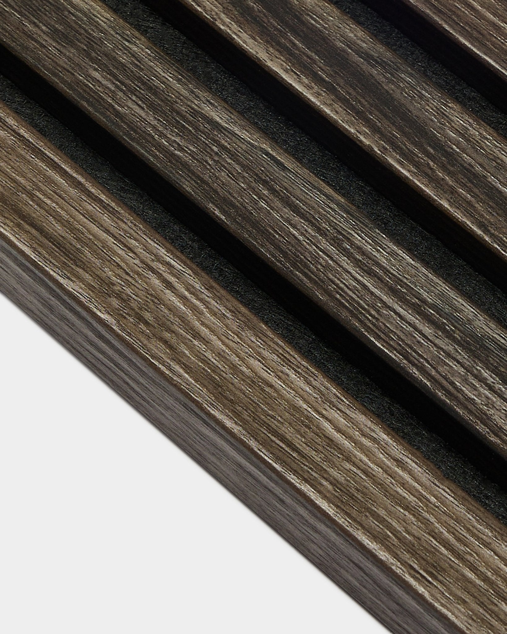 Close-up of dark oak acoustic panel slats with black gaps, showing the texture and detail of WoodUpp Akupanel End Lamella, 2.2 cm thick.