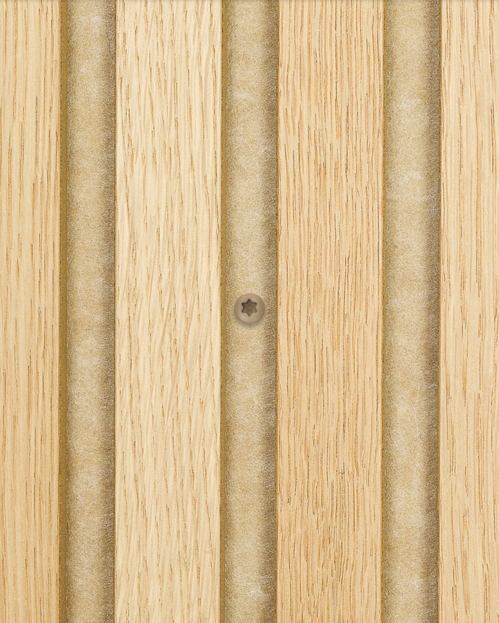 Close-up of beige WoodUpp installation screws securing Akupanel light wood acoustic paneling with vertical grooves; box contains 100 pieces.