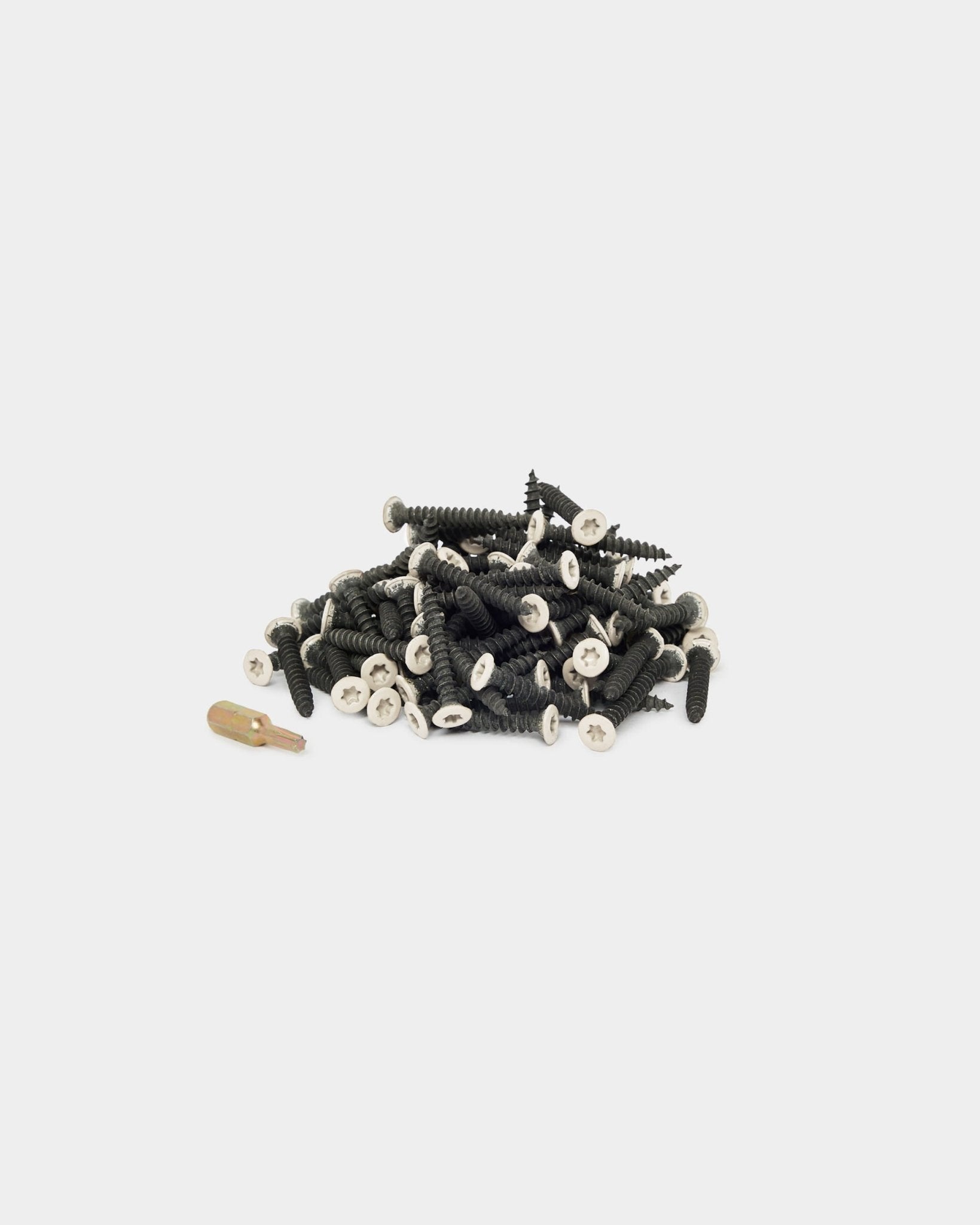 100 light beige screws and a wall plug for installing WoodUpp acoustic panels, displayed on a plain white background.