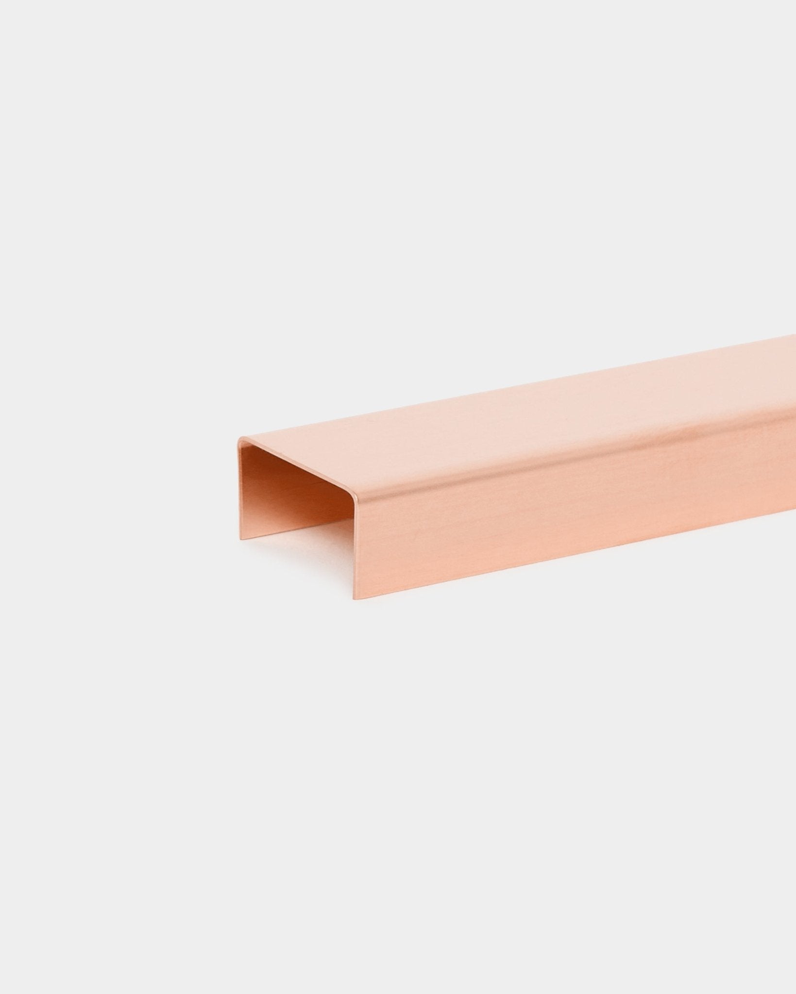 Liva Cover in copper, 120 cm by WoodUpp—a minimalist copper U-channel bar designed to complement acoustic panels or serve as a metal cover.