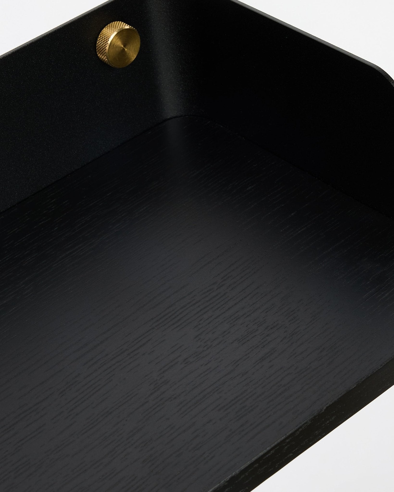 Close-up of WoodUpp Linn Bookshelf in Black Oak (55.9 cm) showing Nordic wood grain texture and gold screw detail, designed to coordinate with Akupanel collection.