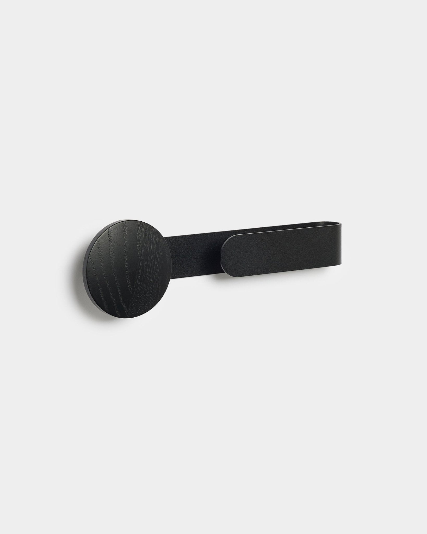 The Linn | Horizontal Hanger in Black Oak by WoodUpp, a minimalist black powder-coated steel and wood accessory set against a light grey background.