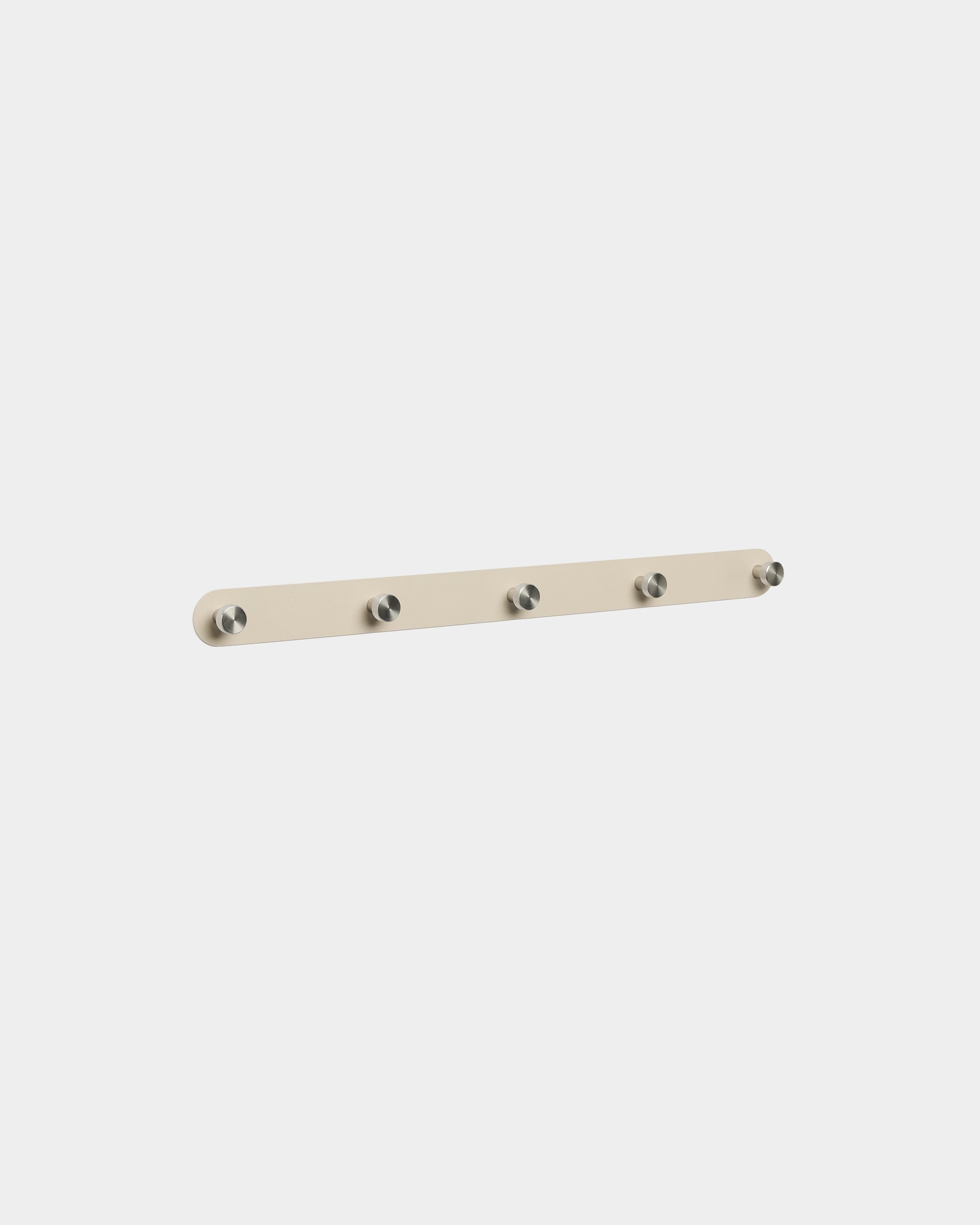 Norr Coat Hook Rack by WoodUpp with 5 beige and stainless steel hooks, designed as an accessory for organizing spaces alongside Nordic acoustic wood panels.